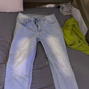 lightly washed blue jeans